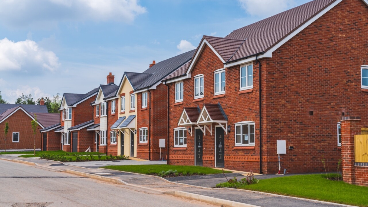 Homes in a neighbourhood with a sunny sky